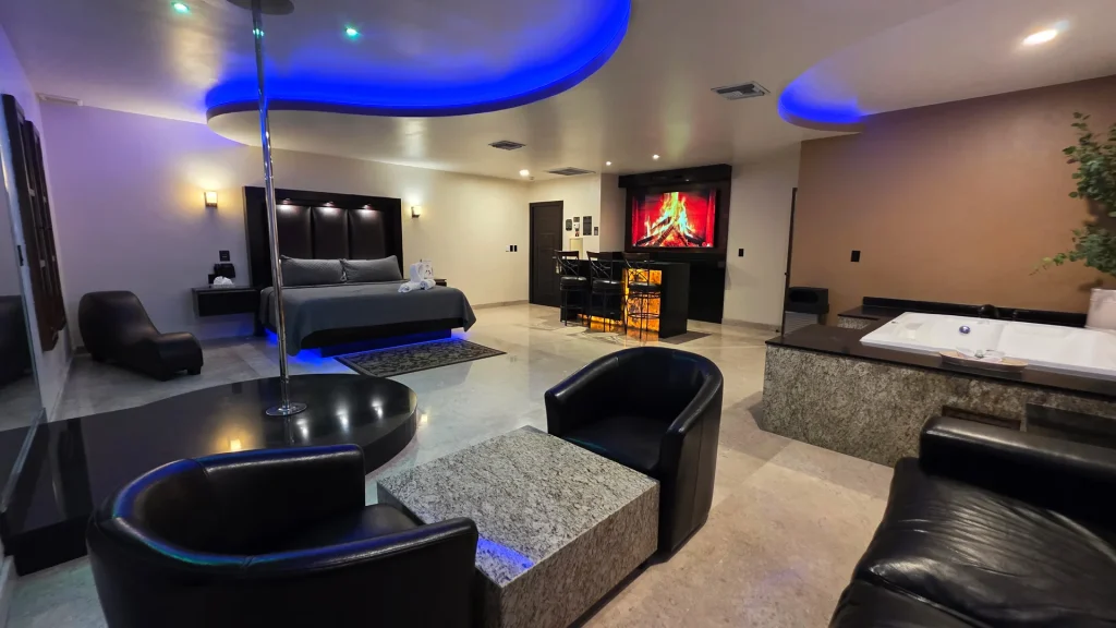 Master Junior VIP Room with pole stage, King Size bed, illuminated bar and jacuzzi